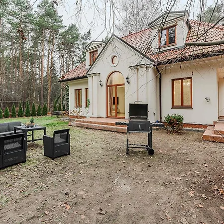 With Patio Nyaraló Varsó